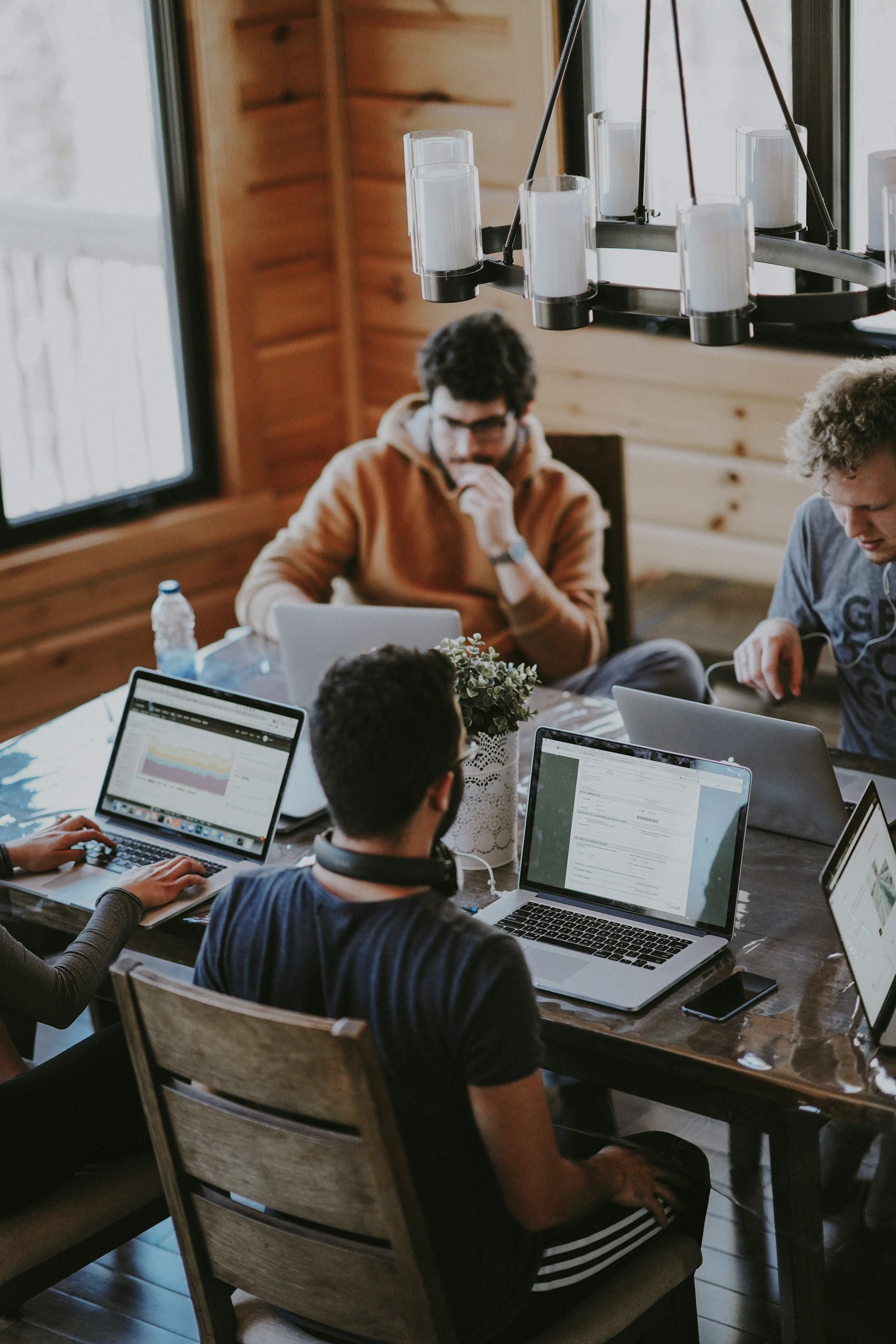 People collaborating at a table.